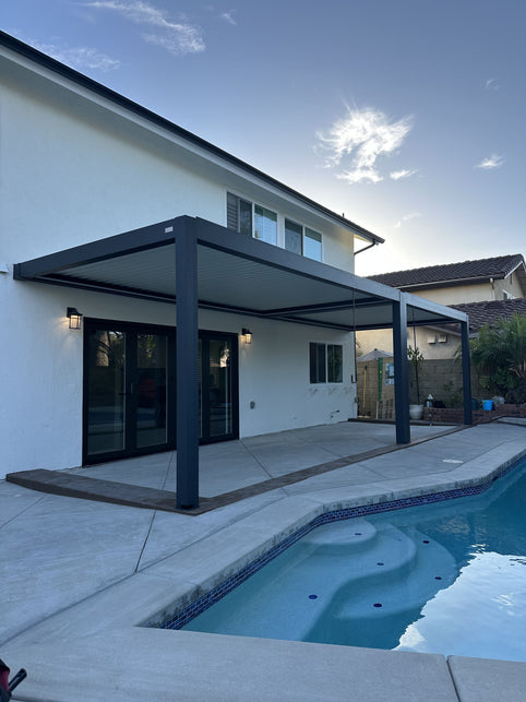 Aluminum pergola installation crew working on a Southern California backyard patio