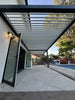 Compact aluminum pergola maximizing shade in a small California backyard