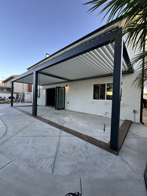 Aluminum pergola oriented for optimal sun and shade in a California backyard