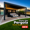 Modern black aluminum louvered pergola installed in a Mission Viejo backyard with Mediterranean-style tile-roof home, bougainvillea, and palm trees at golden hour