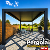 Modern black aluminum louvered pergola installed in a Santa Ana Craftsman-style backyard with drought-tolerant landscaping and vintage bungalow home at golden hour